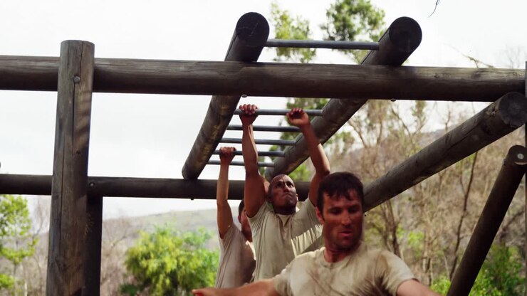 Military soldiers climbing monkey bars 4k