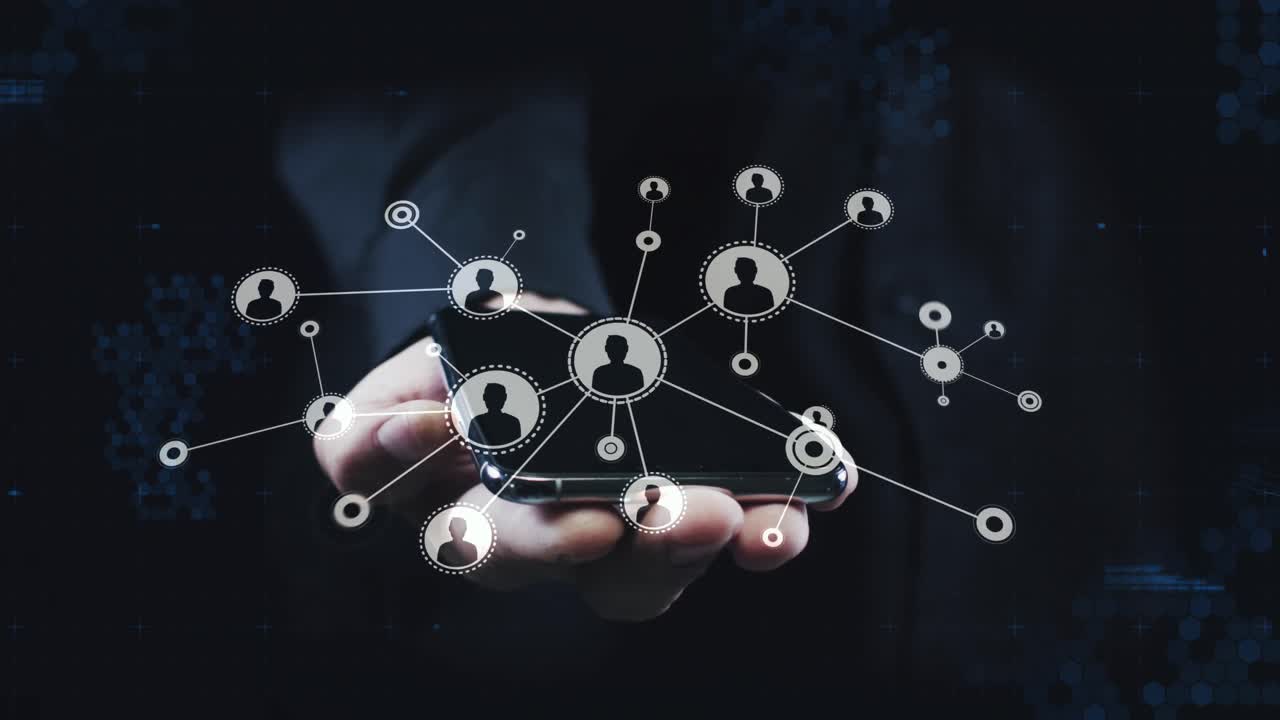 Animation of network of connections with icons over smartphone screen held by businessman