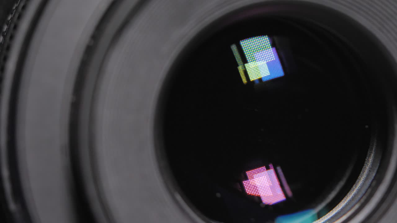 Diaphragm blades of the fixed lens opening and closing aperture f-stop adjustment of a photo camera close-up shot