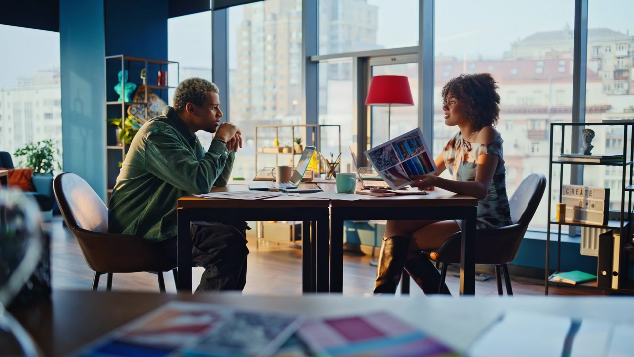 Man woman discussing project design office. Coworkers talking business meeting