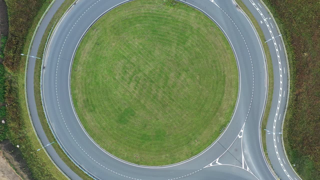 Circular road with cars. Aerial top view