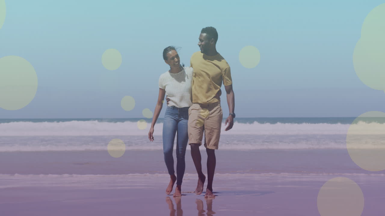 animación de puntos de luz sobre una pareja afroamericana caminando y abrazándose