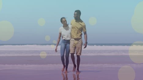 animación de puntos de luz sobre una pareja afroamericana caminando y abrazándose