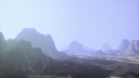 expansive desert landscape with distant mountains under soft daylight