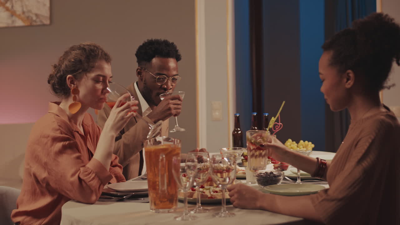 Multiethnic Group of People at Dinner Party