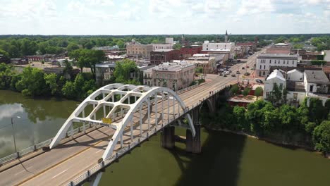 edmund pettus bridge in selma, alabama with drone video moving up to skyline