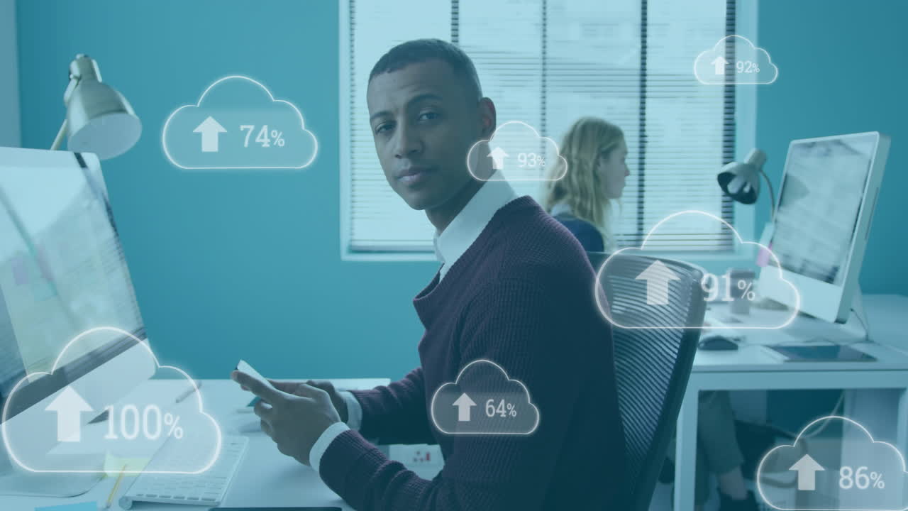 animación de nubes con porcentaje de crecimiento sobre hombre de negocios afroamericano usando teléfono