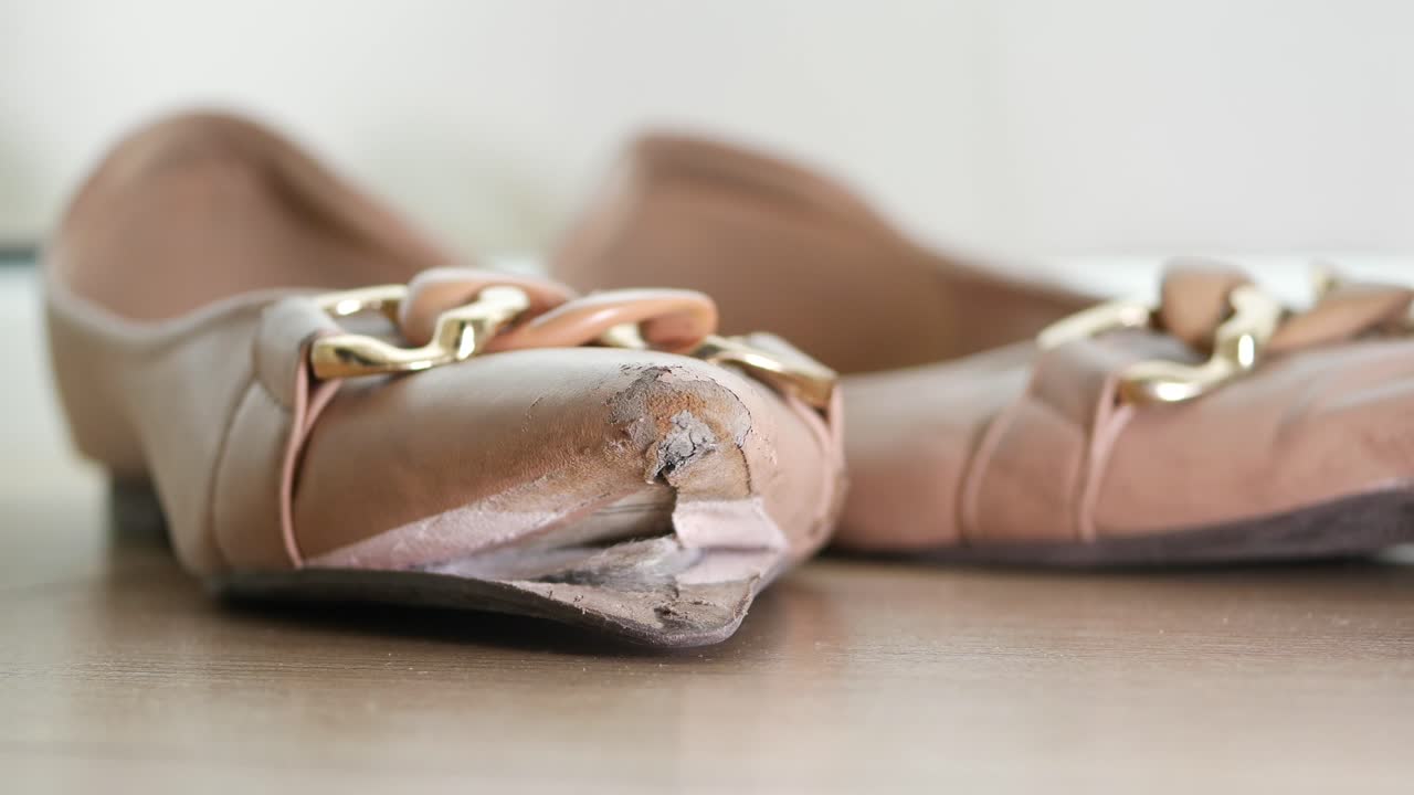 Damaged Pair of Flats