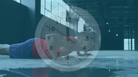el reloj marca contra el hombre y la mujer afroamericanos que realizan ejercicios de flexión