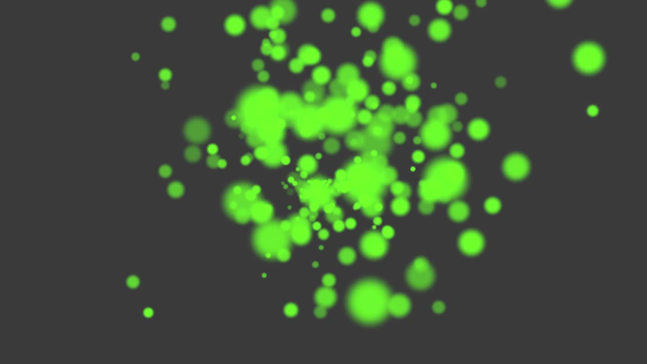 Green particles and round bokeh on shiny background