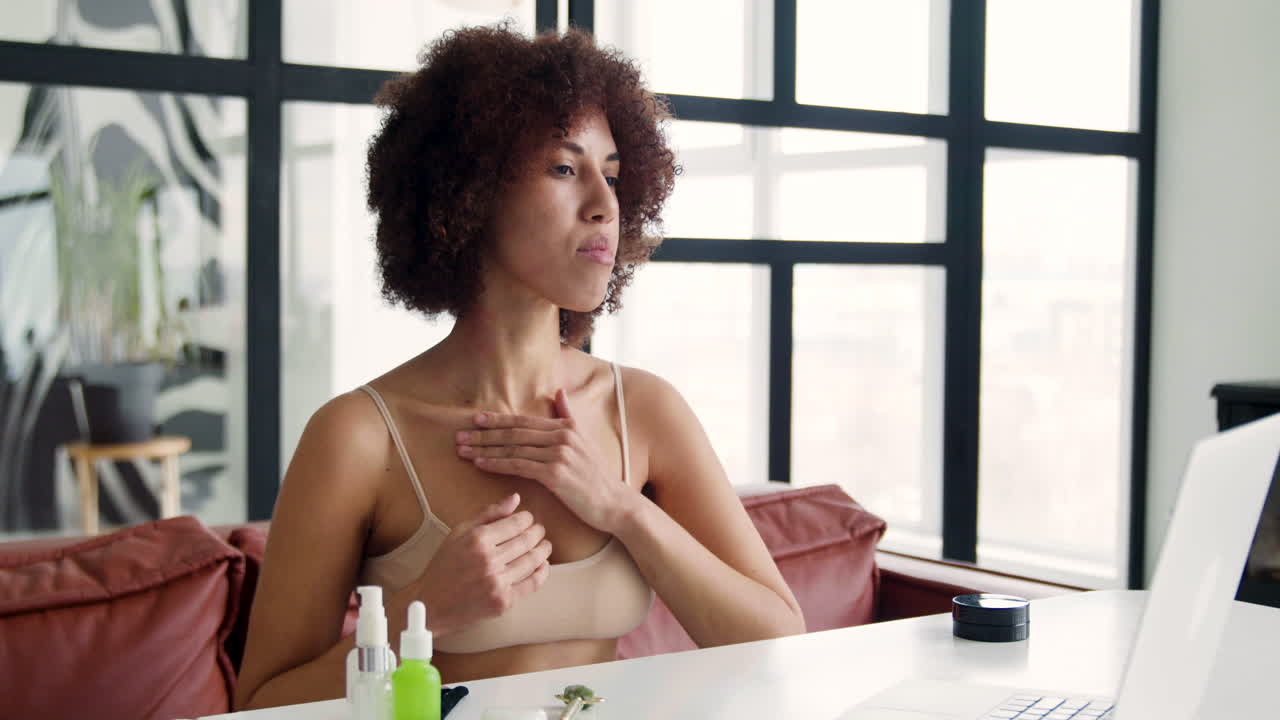 Woman looking at laptop