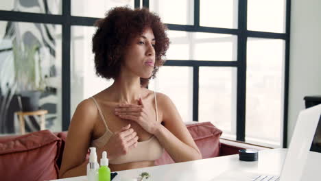 woman looking at laptop