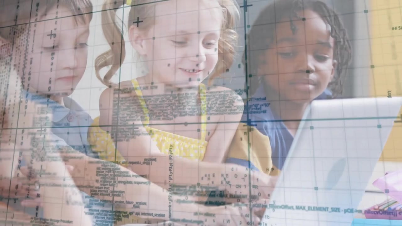 Children leaning over laptop and tablet with code overlay drifting, tapping during digital lesson