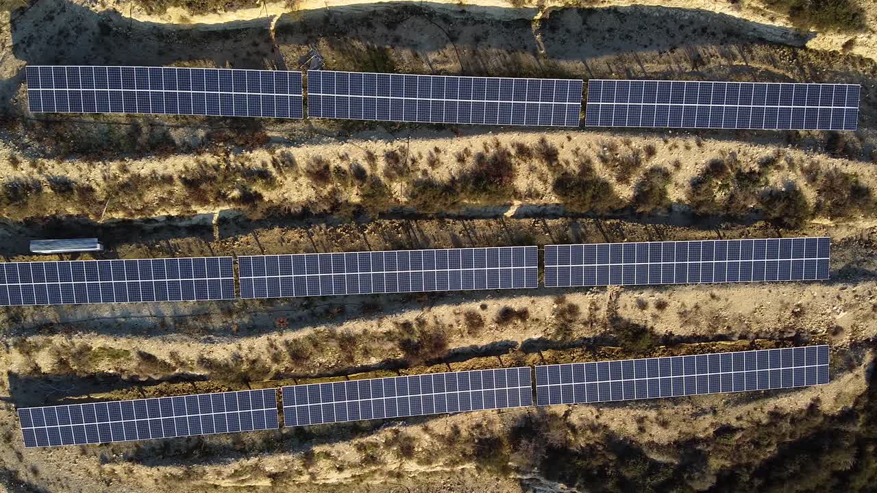 Extreme wide view looking down on large solar panels