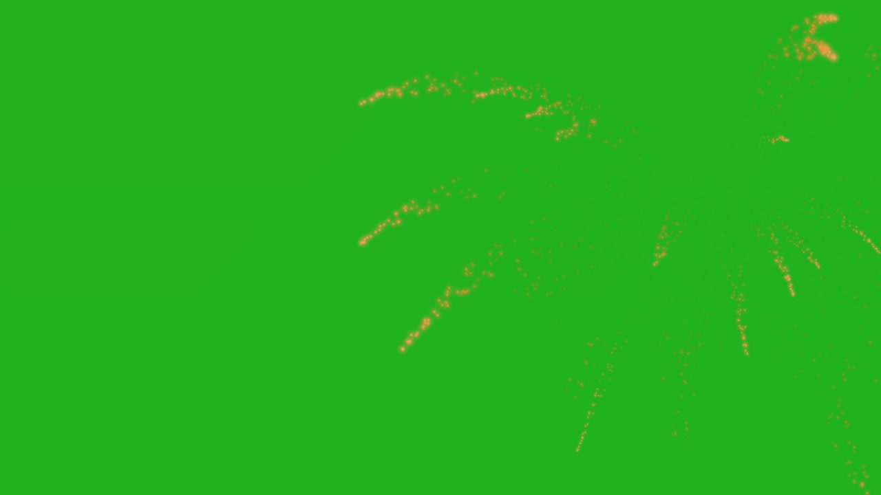 los fuegos artificiales naranjas chispas en la pantalla verde