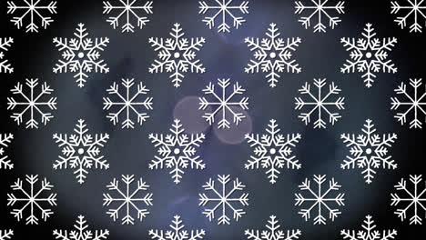 animation of red pattern moving over rows of snowflakes