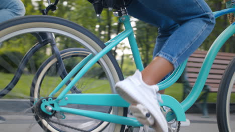 couple cycling in a park