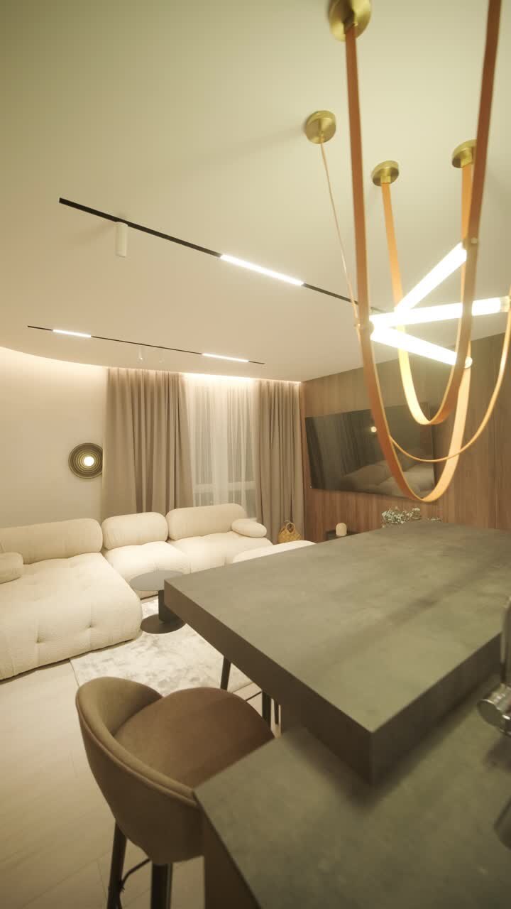 Stylish and elegant minimalist home interior featuring clean lines, neutral colors, and warm ambient lighting, creating a cozy and modern atmosphere.