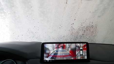 car dashboard view during automatic car wash