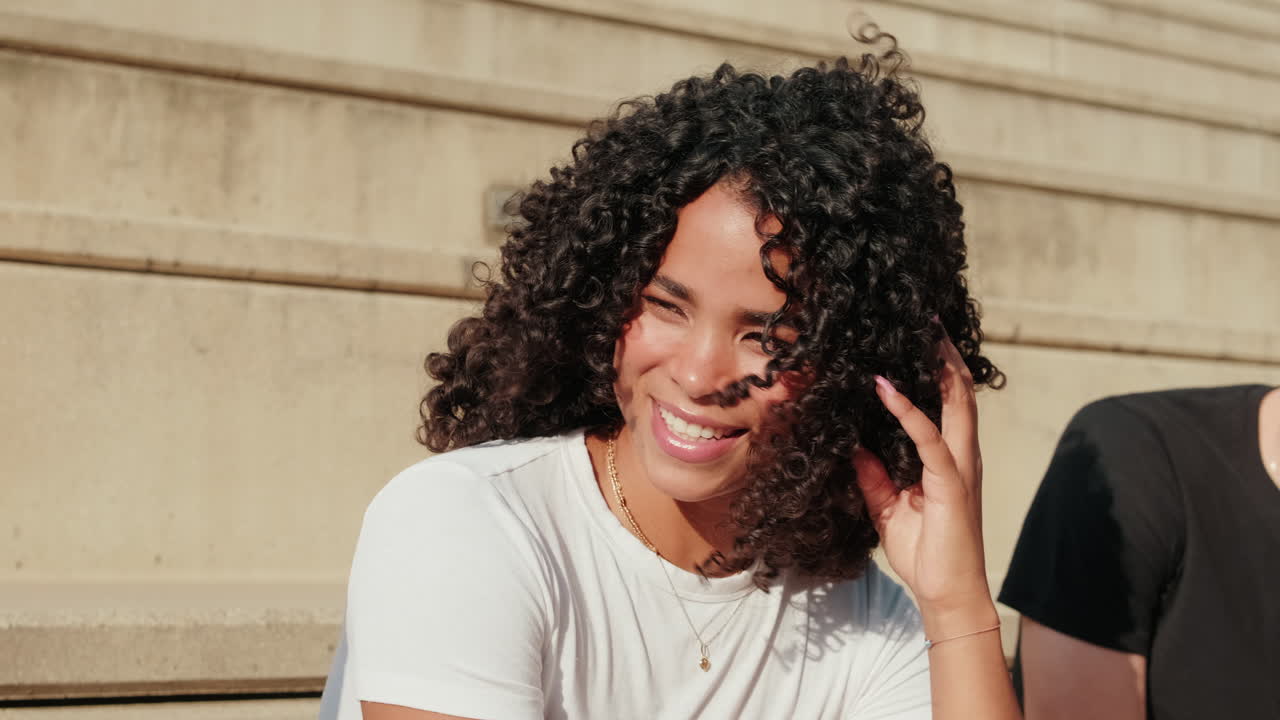 Millennial group of diverse young friends talking outdoors. Close up of an