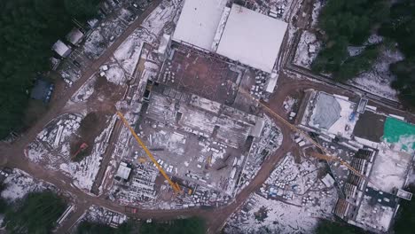 aerial view of construction site in winter