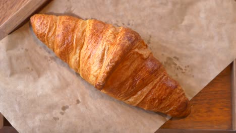 croissant and grease stain on parchment paper