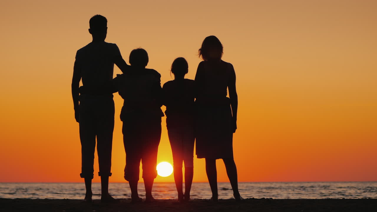 Happy Multi-Generational Family Enjoying Sunset Over The Sea Free Stock  Video Footage Download Clips Family