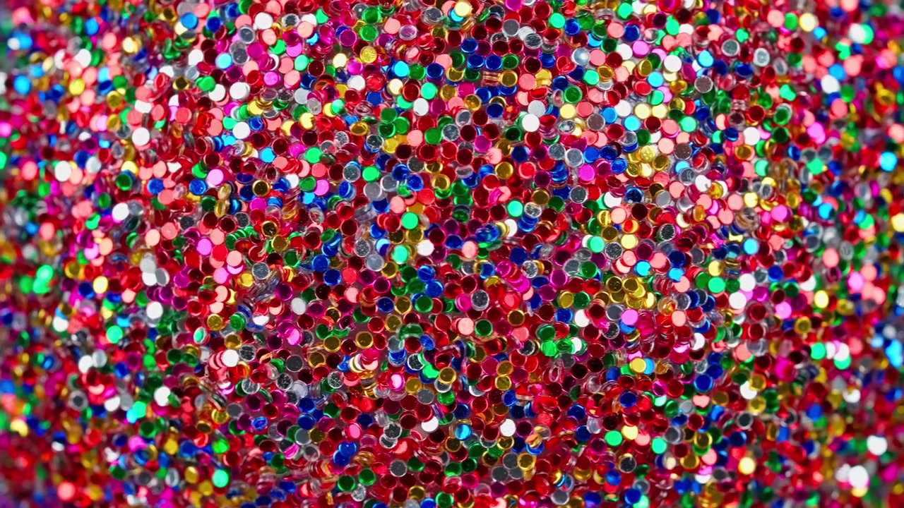Levende farverig glitterkonfetti baggrundstekstur