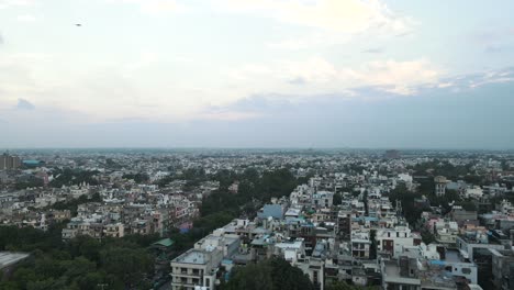 4K-Aerial-Shots-of-New-Delhi-Residential-Suburbs-on-a-beautiful-day-gliding-over-Rooftops,-streets,-parks-and-markets-in-India