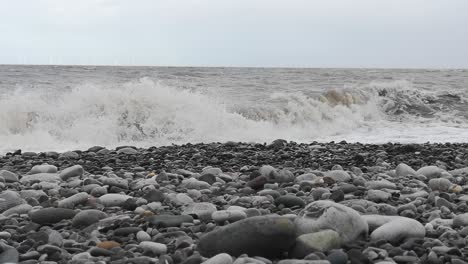 february 2022 storm duncan crashing waves on english pebble stone beach