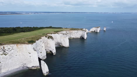 stunning landscape with chalk formation cliffs at old harry rocks, uk