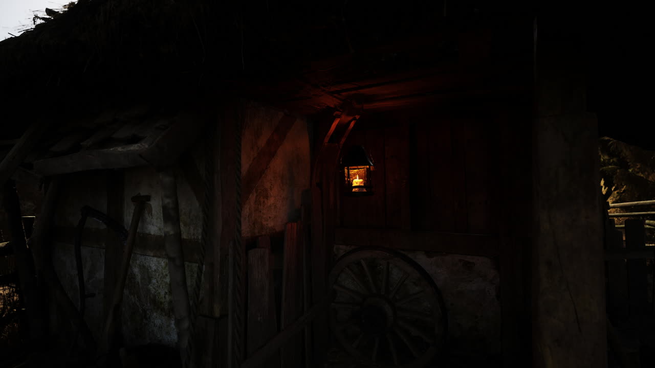 A rustic lantern glowing softly in the dark interior of a vintage barn