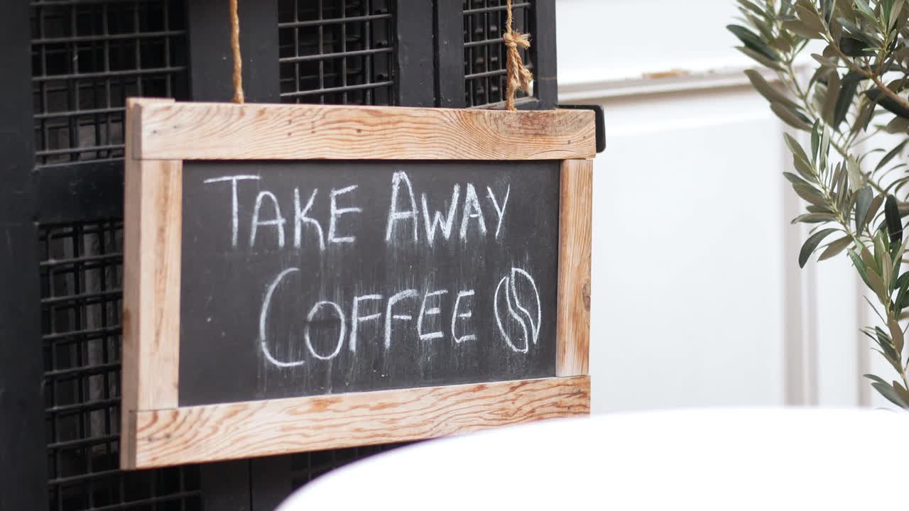 Take Away Coffee Sign at Outdoor Cafe