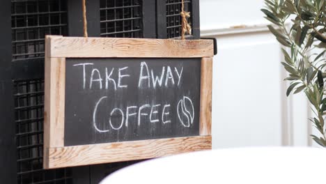 take away coffee sign at outdoor cafe