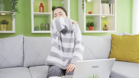 Sick-asian-young-woman-coughing-and-covering-mouth-with-arm.