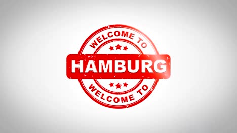 bienvenido a hamburgo firmado texto de estampado animación de sello de madera. tinta roja en papel blanco limpio fondo de superficie con fondo matte verde incluido.