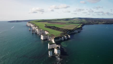 Breathtaking-Smooth-Aerial-Orbit-of-Old-Harry-Rocks-in-Early-Autumn-Light