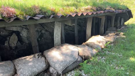 Trench-from-the-first-world-war-at-Isonzo-front-with-sacks-of-stones-in-Kolovrat,-Slovenia