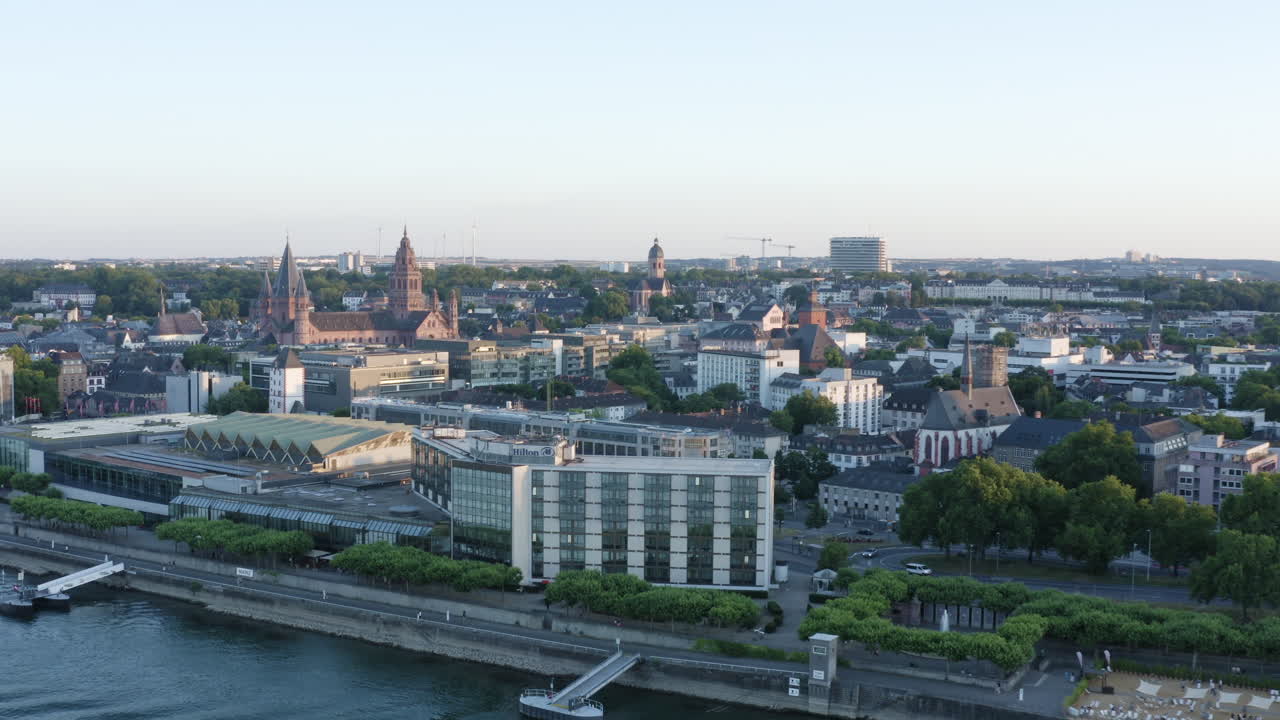 Aerial Drone View of Mainz dom, Rheingoldhalle, river rhine and Cityscape at Sunset Germany 4k