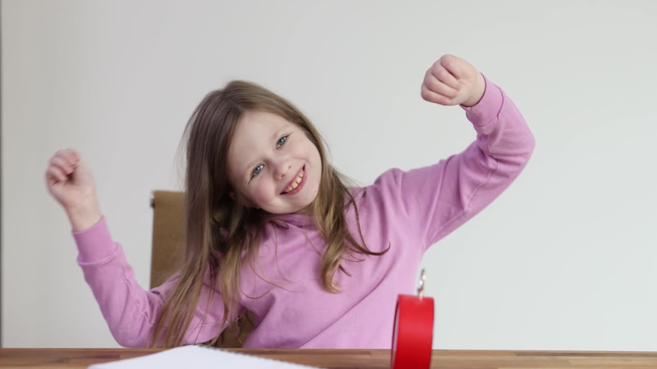 Young girl smiling indoors