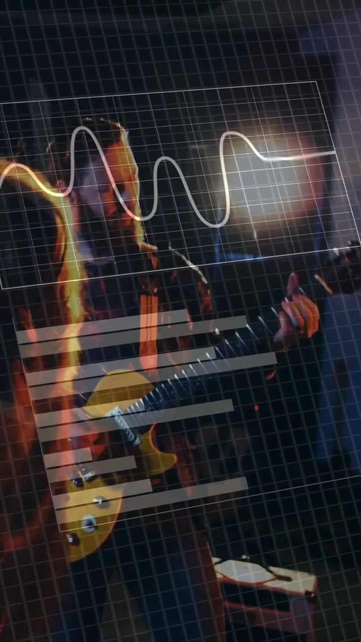 Vertical video: Strumming guitarist in plaid, yellow guitar on stage, light starting HUD for band