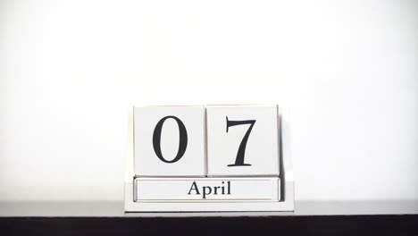 white calendar time lapse april