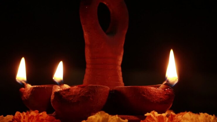 Close up of beautifully lit mud lamps for a festive celebration