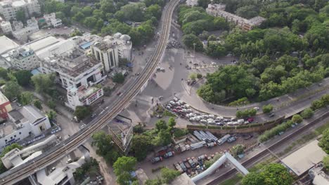 aerial footage of a bridge in the middle of the city with a metro track