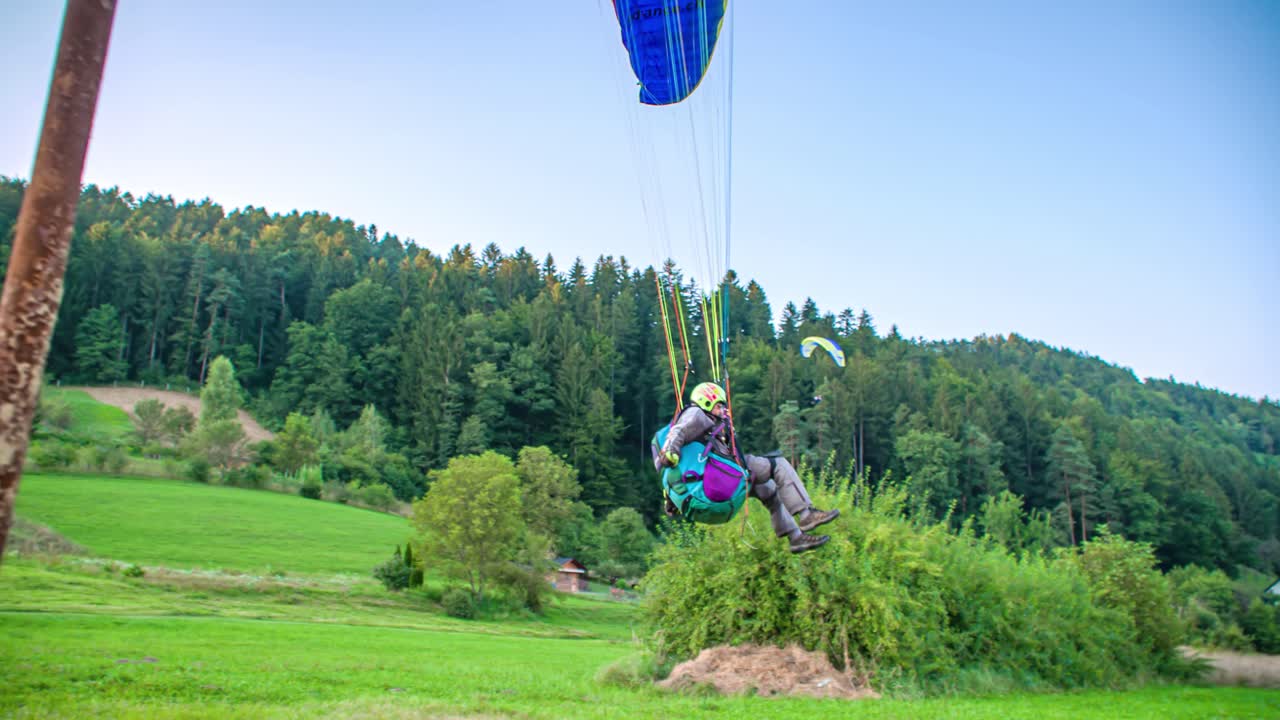 Man gliding with paragliding in Slovenj Gradec, Slovenia. Tracking