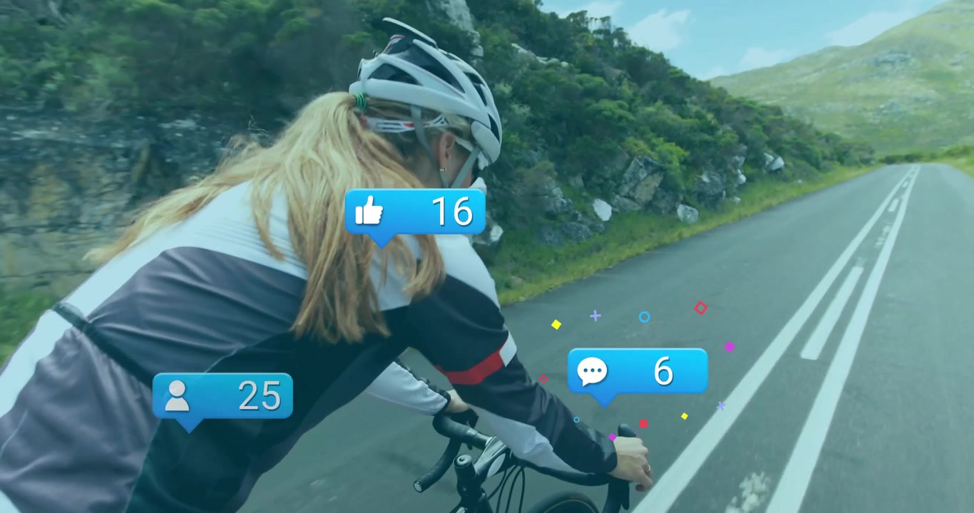 Cyklistka se naklání dopředu do kopce a aktivuje ikony zapojení sociálních médií, přičemž se zvyšují počty.