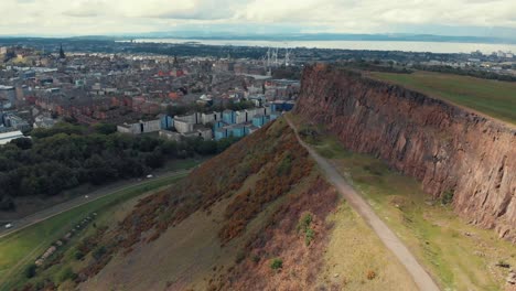 Golden-hour-shot-of-Holyrood-Park,-Arthurs-Seat-in-Edinburgh,-Scotland,-UK