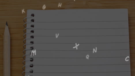 animation of letters changing over ruled notebook and pencil