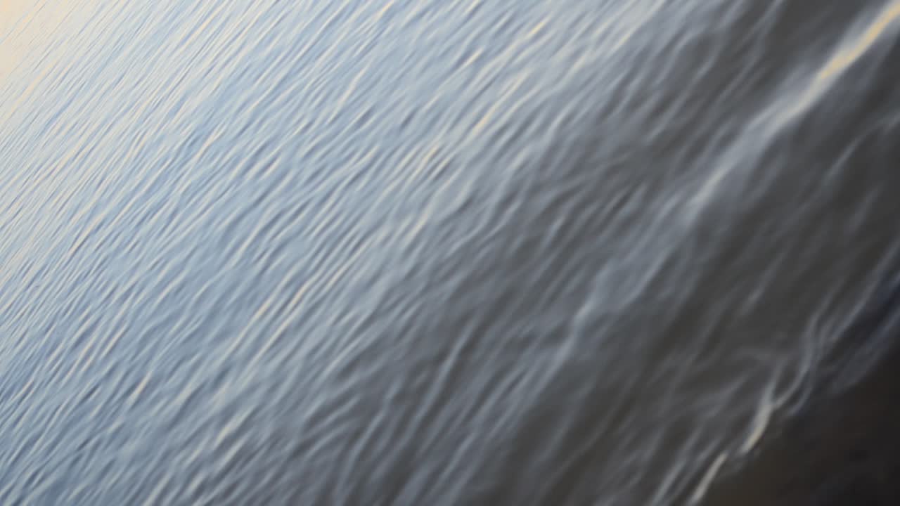 Shooting in the evening. Sea smooth surface