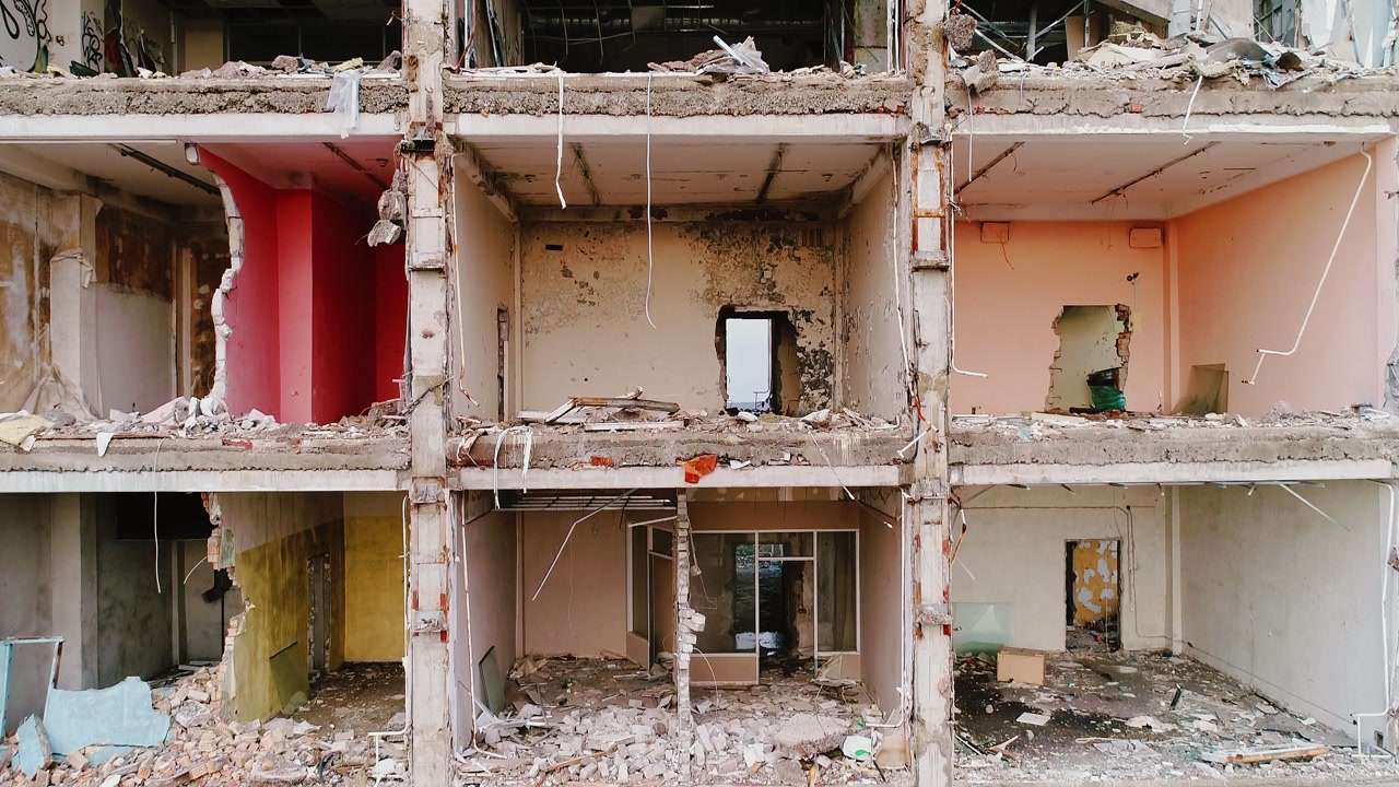 Ruins of civilian homes, echoing global conflicts and humanitarian cost of war